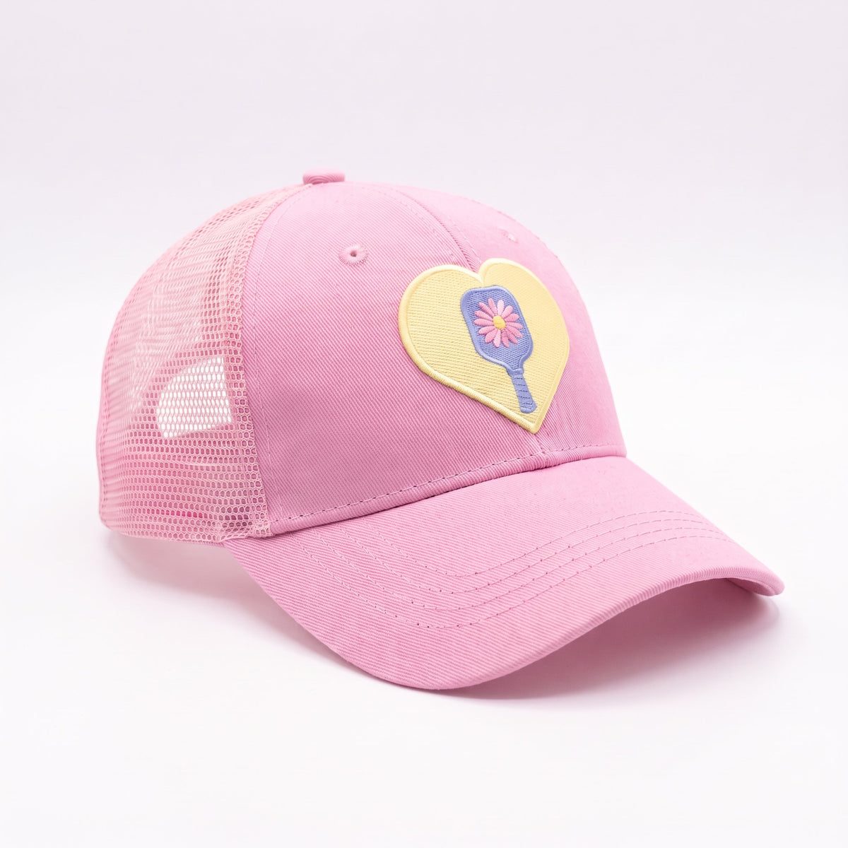 Pickleball Ponytail Trucker Pink Daisy Paddle, three-quarter view